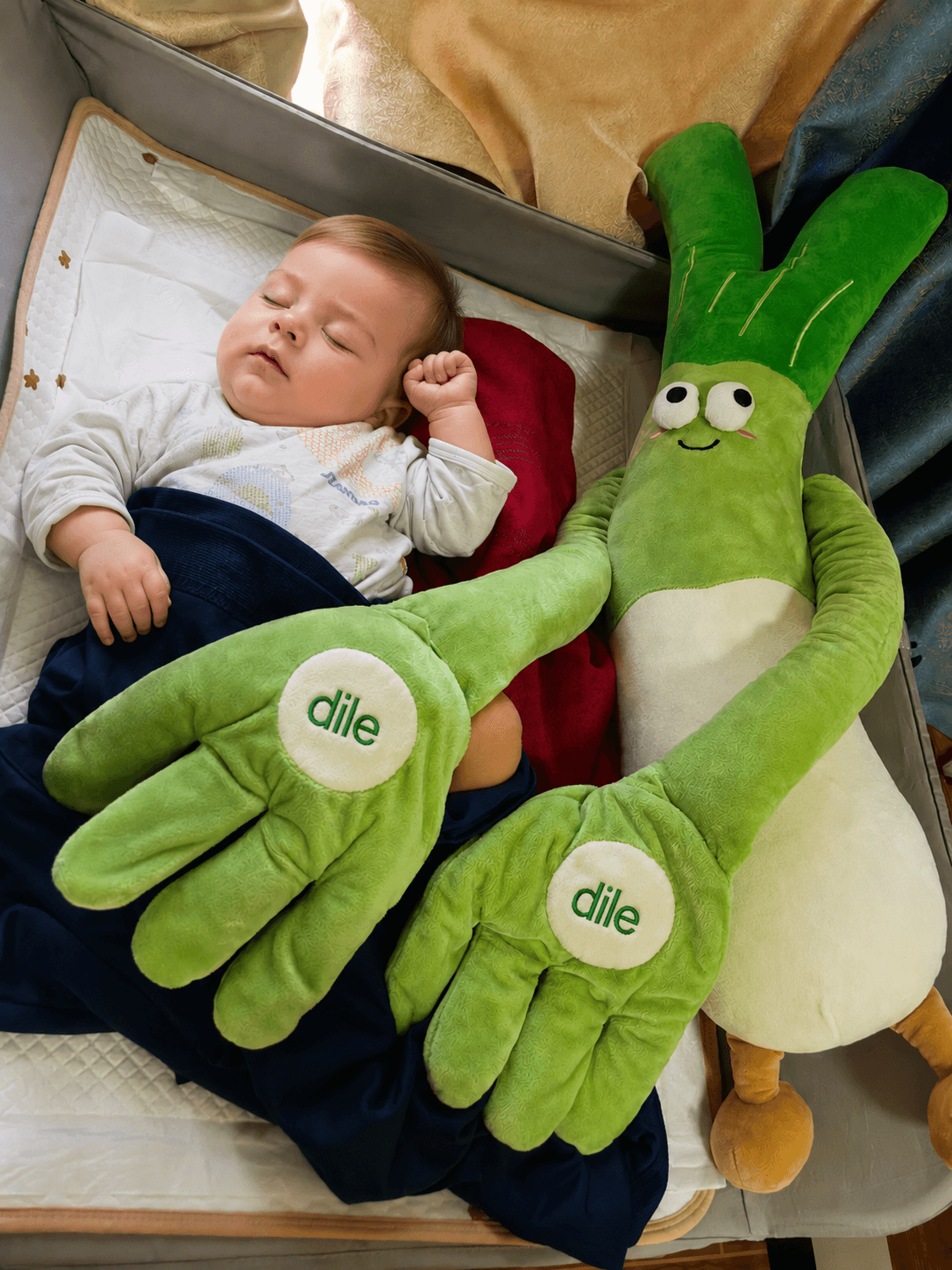 Parent photo: baby napping beside the Dile Sleep Companion